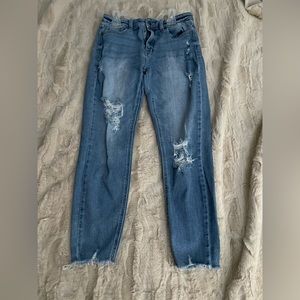 Blue ripped jeans. Ankle high. Size 7.